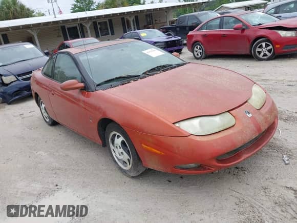 2002 Saturn SC with VIN 1G8ZR12742Z146956, listed as a IAAI auction lot 42175290 with Not provided miles and . Bid and sale history available at DreamBid. Image 1.