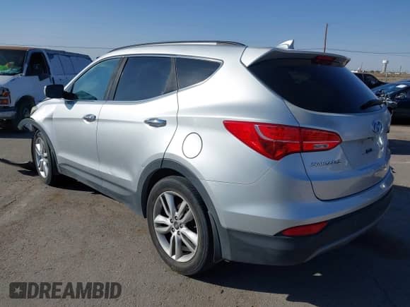 2015 Hyundai Santa Fe with VIN 5XYZWDLA8FG255743, listed as a IAAI auction lot 42014071 with 168,897 mi miles and . Bid and sale history available at DreamBid. Image 3.