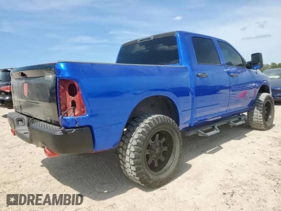 2015 Ram 1500 Express with VIN 1C6RR6KT3FS676048, listed as a Copart auction lot 66008255 with 127,457 mi miles and Salvage title. Bid and sale history available at DreamBid. Image 3.