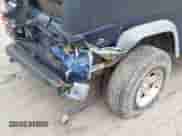 2005 Jeep Wrangler with VIN 1J4FA44585P364417, listed as a IAAI auction lot 42028538 with 206,545 mi miles and . Bid and sale history available at DreamBid. Image 6.