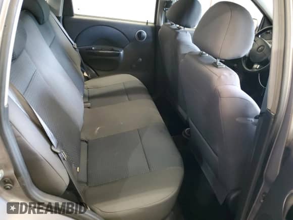 2007 Chevrolet Aveo LS z VIN KL1TD66697B790050, wystawiony jako Copart lot #59368525 z przebiegiem Nie podano mil oraz Szkoda całkowita • Salvage title. Historia ofert i sprzedaży dostępna na DreamBid. Obrazek 10.