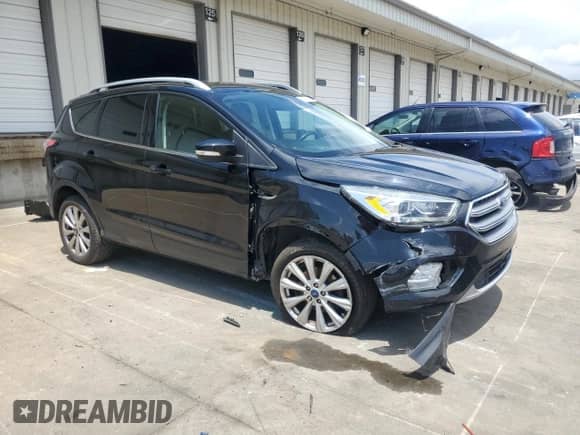 2017 Ford Escape Titanium с VIN 1FMCU0JD3HUC22843, выставлен на аукционе Copart как лот 64281665 с пробегом 155 907 миль миль и Списание • Salvage title. История ставок и продаж доступна на DreamBid. Изображение 4.