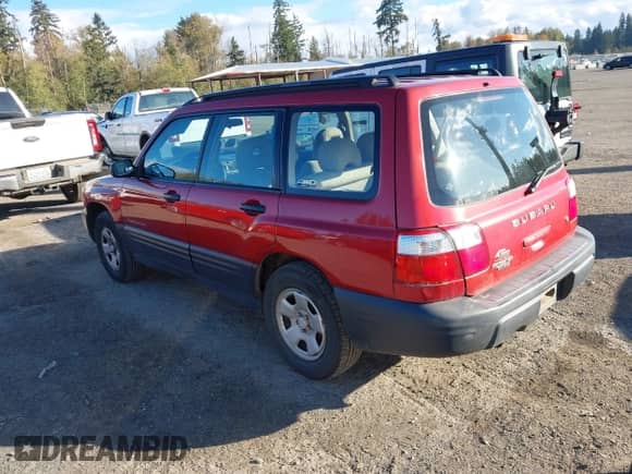 2001 Subaru Forester L with VIN JF1SF63551H763318, listed as a IAAI auction lot 43511536 with 215,327 mi miles and . Bid and sale history available at DreamBid. Image 3.