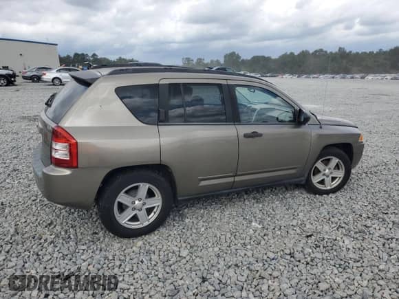 2008 Jeep Compass Sport с VIN 1J8FT47098D660985, выставлен на аукционе Copart как лот 82090525 с пробегом 140 750 миль миль и Списание • Salvage title. История ставок и продаж доступна на DreamBid. Изображение 3.