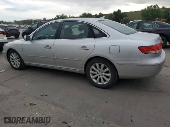 2009 Hyundai Azera GLS z VIN KMHFC46D39A349885, wystawiony jako Copart lot #60717555 z przebiegiem 172 329 mil mil oraz Czysty tytuł • Clean title. Historia ofert i sprzedaży dostępna na DreamBid. Obrazek 2.