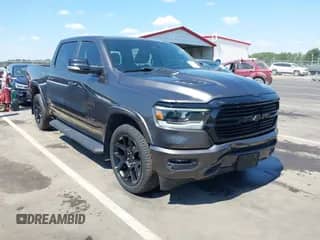 2021 Ram 1500 Laramie z VIN 1C6SRFJT3MN581701, wystawiony jako IAAI lot #43136993 z przebiegiem 96 977 mil mil oraz . Historia ofert i sprzedaży dostępna na DreamBid. Obrazek 1.