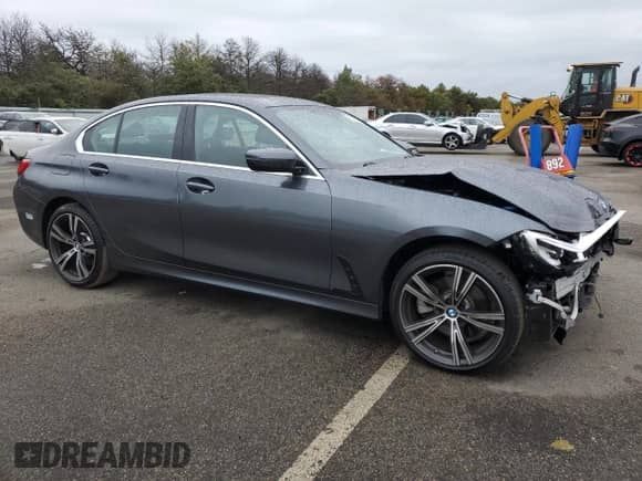 2021 BMW 3 Series 330e xDrive z VIN 3MW5P9J02M8B64508, wystawiony jako Copart lot #73336224 z przebiegiem 28 822 mil mil oraz Szkoda całkowita • Salvage title. Historia ofert i sprzedaży dostępna na DreamBid. Obrazek 4.