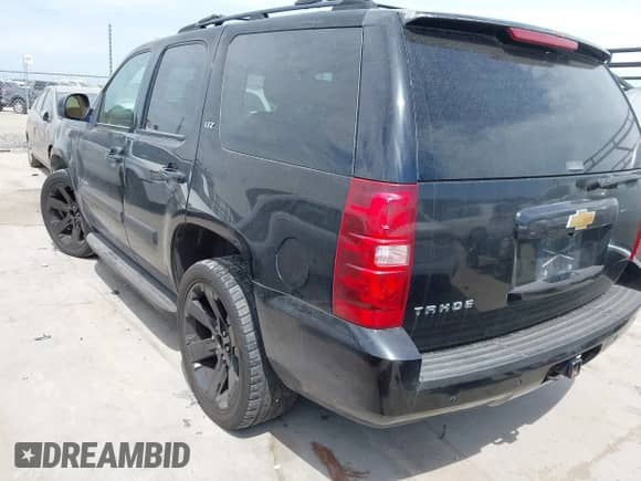 2007 Chevrolet Tahoe LT with VIN 1GNFC13087R188069, listed as a IAAI auction lot 42473664 with 195,237 mi miles and . Bid and sale history available at DreamBid. Image 3.