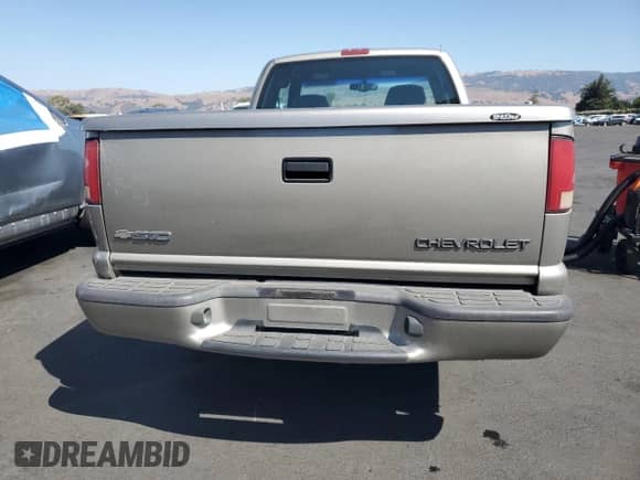 2001 Chevrolet S-10 LS с VIN 1GCCS19WX18150253, выставлен на аукционе Copart как лот 81820145 с пробегом 211 370 миль миль и Списание • Salvage title. История ставок и продаж доступна на DreamBid. Изображение 6.