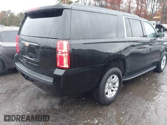 2019 Chevrolet Suburban LS z VIN 1GNSCGKC5KR321327, wystawiony jako IAAI lot #41069977 z przebiegiem 282 308 mil mil oraz . Historia ofert i sprzedaży dostępna na DreamBid. Obrazek 4.