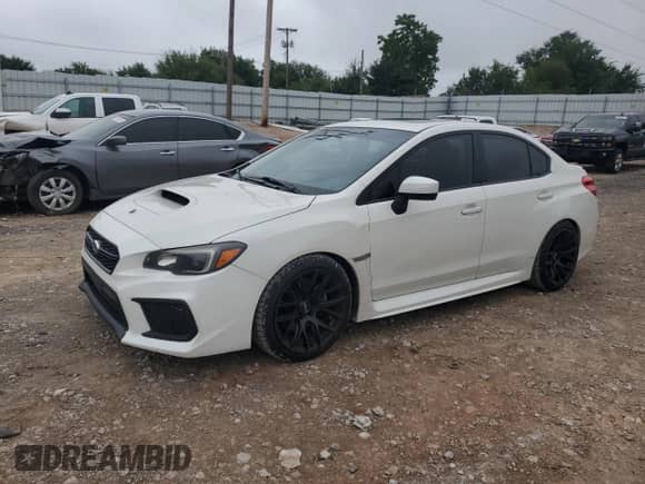 2020 Subaru WRX Premium with VIN JF1VA1C62L9814875, listed as a Copart auction lot 70986585 with 76,047 mi miles and Salvage title. Bid and sale history available at DreamBid. Image 1.