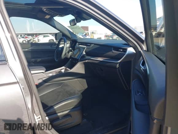 2023 Jeep Grand Cherokee Altitude with VIN 1C4RJKAG4P8855050, listed as a IAAI auction lot 41394806 with 33,990 mi miles and . Bid and sale history available at DreamBid. Image 5.