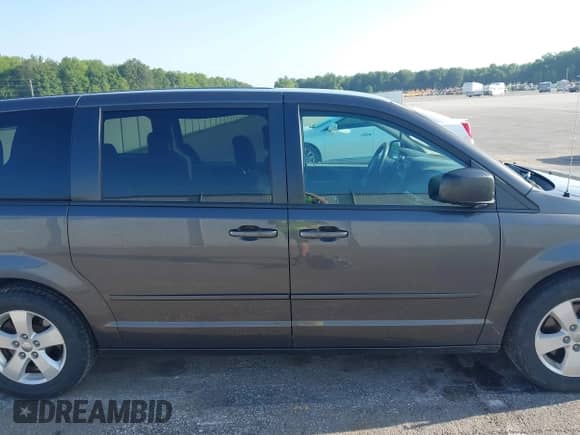 2016 Dodge Grand Caravan American Value with VIN 2C4RDGBG4GR192165, listed as a IAAI auction lot 42562624 with 160,135 mi miles and . Bid and sale history available at DreamBid. Image 14.