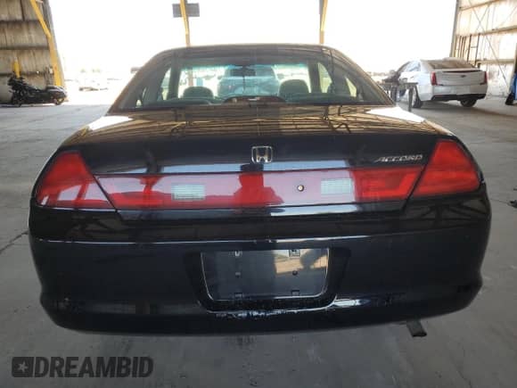 2000 Honda Accord EX with VIN 1HGCG3256YA027990, listed as a Copart auction lot 61879185 with 112,954 mi miles and Salvage title. Bid and sale history available at DreamBid. Image 6.