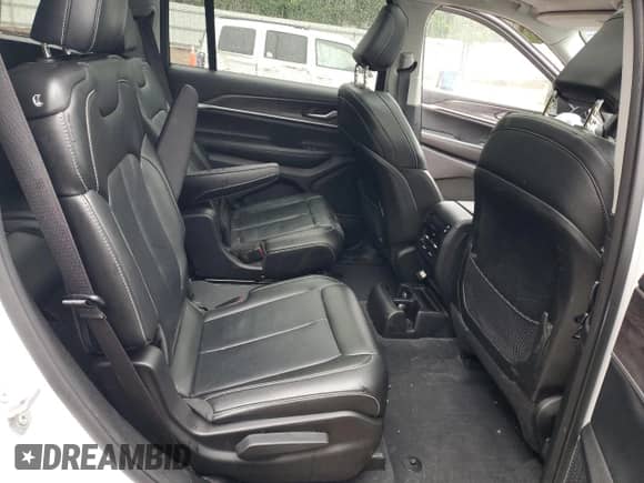 2023 Jeep Grand Cherokee Limited z VIN 1C4RJKBG7P8736049, wystawiony jako Copart lot #57959355 z przebiegiem 52 516 mil mil oraz Szkoda całkowita • Salvage title. Historia ofert i sprzedaży dostępna na DreamBid. Obrazek 11.