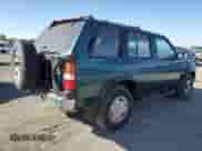 1995 Nissan Pathfinder LE z VIN JN8HD17Y5SW013338, wystawiony jako Copart lot #76463714 z przebiegiem 287 723 mil mil oraz Czysty tytuł • Clean title. Historia ofert i sprzedaży dostępna na DreamBid. Obrazek 3.