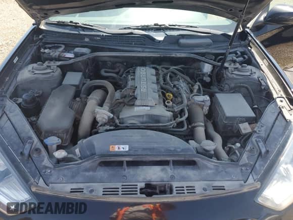2013 Hyundai Genesis Coupe Premium z VIN KMHHT6KD1DU099628, wystawiony jako Copart lot #65856805 z przebiegiem 152 055 mil mil oraz Czysty tytuł • Clean title. Historia ofert i sprzedaży dostępna na DreamBid. Obrazek 11.