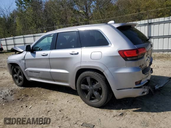 2016 Jeep Grand Cherokee High Altitude z VIN 1C4RJFCG2GC334197, wystawiony jako Copart lot #51495565 z przebiegiem 104 200 mil mil oraz Szkoda całkowita • Salvage title. Historia ofert i sprzedaży dostępna na DreamBid. Obrazek 2.