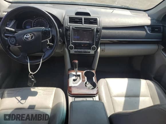 2014 Toyota Camry SE with VIN 4T1BF1FK2EU788636, listed as a Copart auction lot 68917645 with 113,900 mi miles and Salvage title. Bid and sale history available at DreamBid. Image 8.
