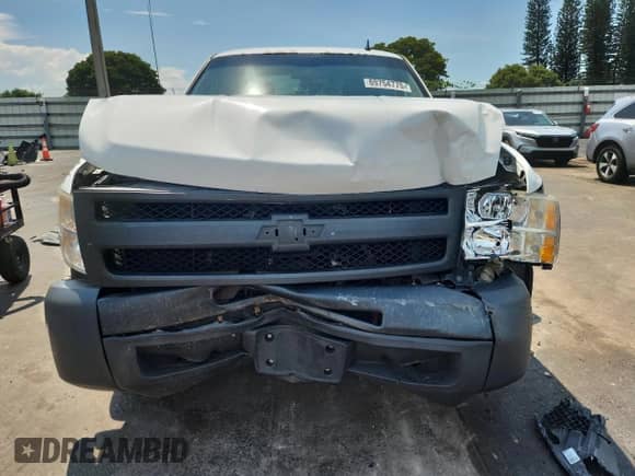 2012 Chevrolet Silverado 1500 Work Truck with VIN 1GCRCPEA9CZ334004, listed as a Copart auction lot 69754775 with 207,213 mi miles and Salvage title. Bid and sale history available at DreamBid. Image 5.