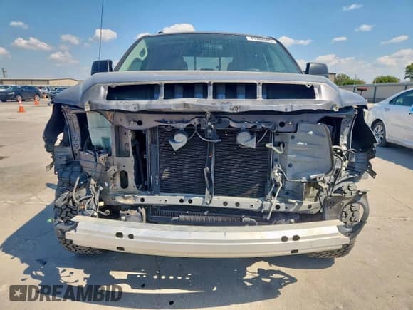 2018 Toyota Tundra SR5 с VIN 5TFRM5F11JX128197, выставлен на аукционе Copart как лот 81984505 с пробегом 168 233 миль миль и Списание • Salvage title. История ставок и продаж доступна на DreamBid. Изображение 5.