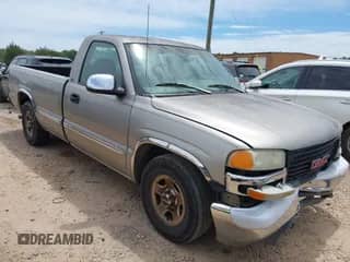 1999 GMC Sierra 1500 SL z VIN 1GTEC14V2XE521601, wystawiony jako IAAI lot #42318338 z przebiegiem Nie podano mil oraz . Historia ofert i sprzedaży dostępna na DreamBid. Obrazek 1.