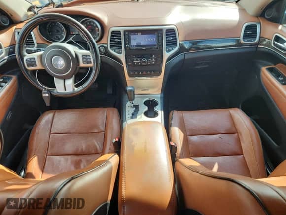 2011 Jeep Grand Cherokee Overland Summit with VIN 1J4RR6GT6BC701489, listed as a Copart auction lot 70597915 with 227,976 mi miles and Salvage title. Bid and sale history available at DreamBid. Image 8.