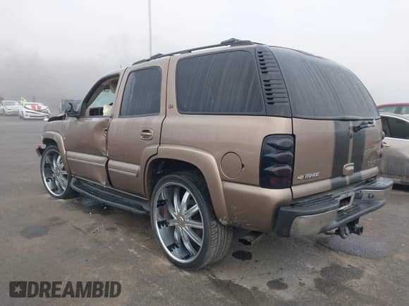 2004 Chevrolet Tahoe LS with VIN 1GNEK13ZX4R206371, listed as a IAAI auction lot 41517575 with Not provided miles and . Bid and sale history available at DreamBid. Image 3.