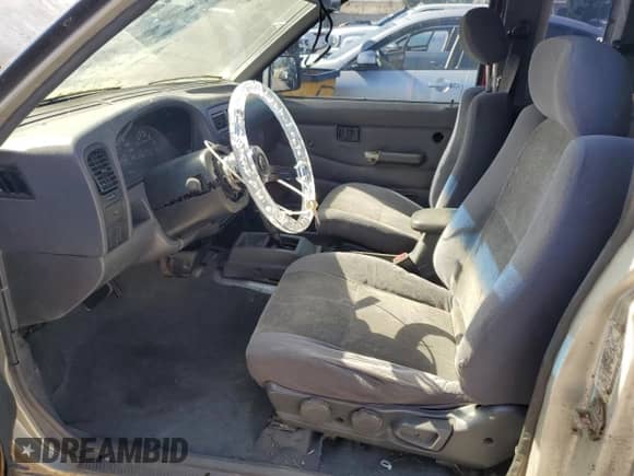 1997 Nissan Frontier XE with VIN 1N6SD16S3VC378098, listed as a Copart auction lot 89777265 with 259,350 mi miles and Salvage title. Bid and sale history available at DreamBid. Image 7.