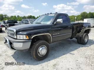 1994 Dodge RAM with VIN 1B7MF3654RS708967, listed as a Copart auction lot 59077115 with 89,023 mi miles and Salvage title. Bid and sale history available at DreamBid. Image 1.