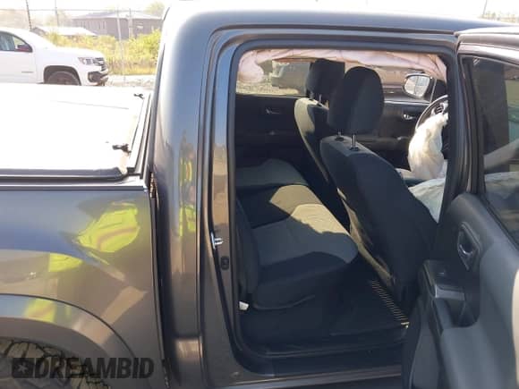 2021 Toyota Tacoma SR with VIN 3TYCZ5AN0MT027247, listed as a IAAI auction lot 43234020 with 26,058 mi miles and . Bid and sale history available at DreamBid. Image 8.
