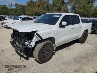 2023 Nissan Frontier Pro-X with VIN 1N6ED1EJ1PN672564, listed as a Copart auction lot 49304865 with 13,575 mi miles and Salvage title. Bid and sale history available at DreamBid. Image 1.