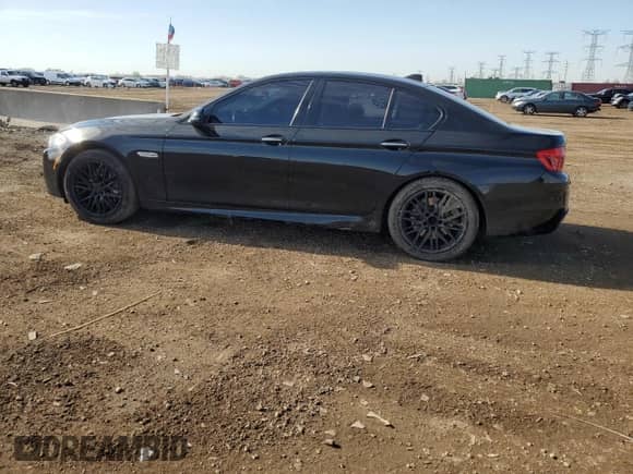 2016 BMW 5 Series 550i xDrive with VIN WBAKP9C58GD980139, listed as a Copart auction lot 54512615 with 110,019 mi miles and Salvage title. Bid and sale history available at DreamBid. Image 2.