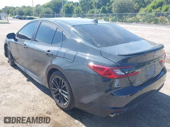 2025 Toyota Camry SE with VIN 4T1DAACK3SU564721, listed as a IAAI auction lot 43041281 with 34,950 mi miles and . Bid and sale history available at DreamBid. Image 3.