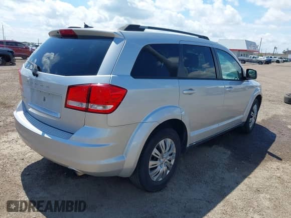 2014 Dodge Journey American Value with VIN 3C4PDCAB9ET210515, listed as a IAAI auction lot 43067776 with 166,251 mi miles and . Bid and sale history available at DreamBid. Image 4.