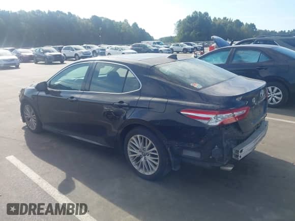 2019 Toyota Camry XSE z VIN 4T1BZ1HK1KU507488, wystawiony jako IAAI lot #43268611 z przebiegiem 128 395 mil mil oraz . Historia ofert i sprzedaży dostępna na DreamBid. Obrazek 3.