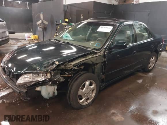 2000 Honda Accord EX z VIN 1HGCG6671YA158757, wystawiony jako IAAI lot #41702446 z przebiegiem 192 431 mil mil oraz . Historia ofert i sprzedaży dostępna na DreamBid. Obrazek 2.