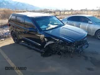 2006 Jeep Grand Cherokee SRT-8 with VIN 1J8HR78346C320888, listed as a IAAI auction lot 41216235 with 143,360 mi miles and . Bid and sale history available at DreamBid. Image 1.