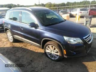 2011 Volkswagen Tiguan SE with VIN WVGAV7AX5BW512469, listed as a IAAI auction lot 42673142 with 165,159 mi miles and . Bid and sale history available at DreamBid. Image 1.