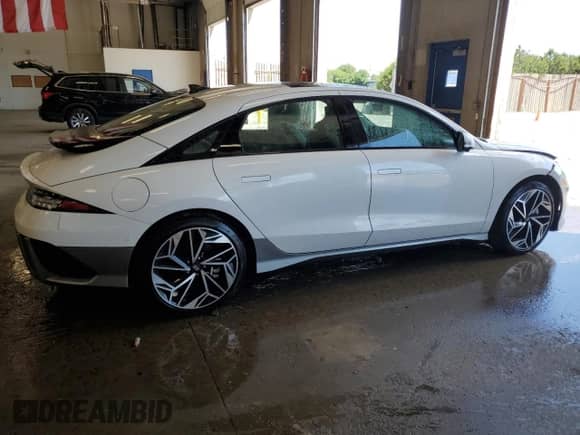 2023 Hyundai Ioniq 6 Limited с VIN KMHM54AC0PA032031, выставлен на аукционе Copart как лот 62674775 с пробегом 22 004 миль миль и Списание • Salvage title. История ставок и продаж доступна на DreamBid. Изображение 3.