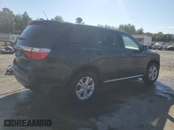 2013 Dodge Durango SXT with VIN 1C4RDHAG1DC500260, listed as a Copart auction lot 84583065 with 193,589 mi miles and Salvage title. Bid and sale history available at DreamBid. Image 3.