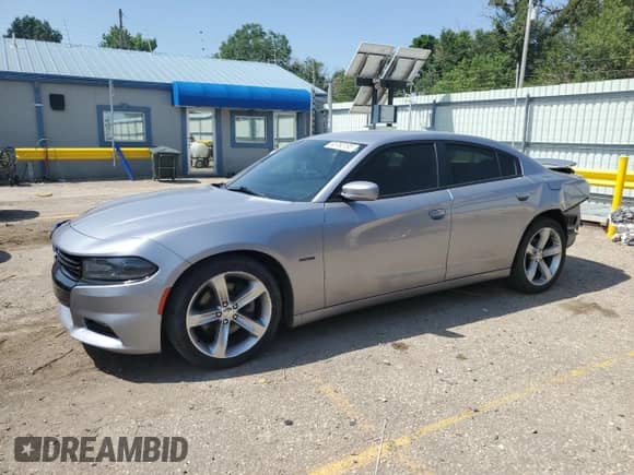 2016 Dodge Charger R/T with VIN 2C3CDXCT8GH346730, listed as a Copart auction lot 65763195 with 103,253 mi miles and Salvage title. Bid and sale history available at DreamBid. Image 1.
