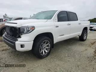 2014 Toyota Tundra Limited z VIN 5TFFY5F14EX163359, wystawiony jako Copart lot #74510114 z przebiegiem 125 288 mil mil oraz Nie do naprawy • Non repairable. Historia ofert i sprzedaży dostępna na DreamBid. Obrazek 1.