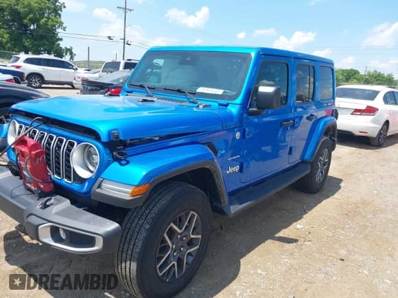 2024 Jeep Wrangler Sahara with VIN 1C4PJXEG9RW370965, listed as a IAAI auction lot 42712632 with 2,113 mi miles and . Bid and sale history available at DreamBid. Image 2.