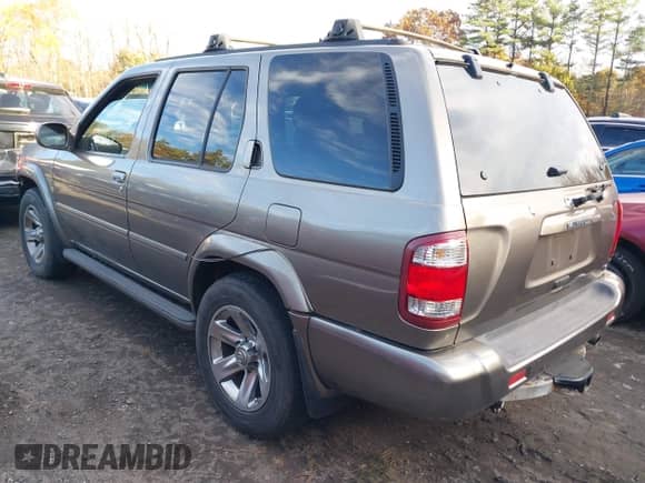 2004 Nissan Pathfinder SE z VIN JN8DR09Y44W908815, wystawiony jako IAAI lot #41358024 z przebiegiem 88 712 mil mil oraz . Historia ofert i sprzedaży dostępna na DreamBid. Obrazek 3.