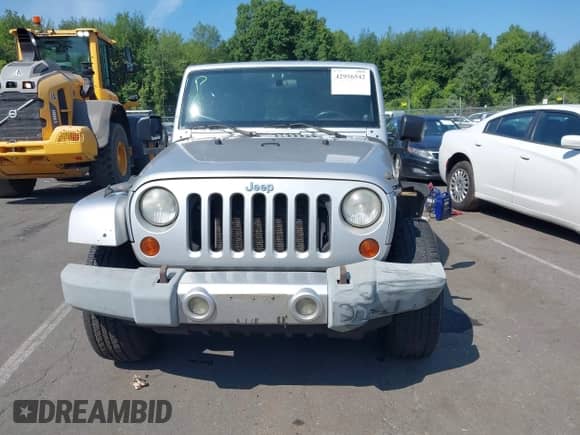 2008 Jeep Wrangler Unlimited Sahara с VIN 1J4GA59118L623149, выставлен на аукционе IAAI как лот 42956542 с пробегом 208 616 миль миль и . История ставок и продаж доступна на DreamBid. Изображение 13.