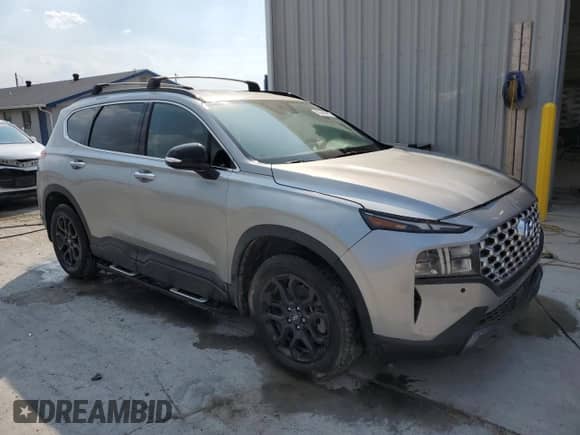 2022 Hyundai Santa Fe XRT z VIN 5NMS64AJ1NH409363, wystawiony jako Copart lot #81448415 z przebiegiem 61 768 mil mil oraz Czysty tytuł • Clean title. Historia ofert i sprzedaży dostępna na DreamBid. Obrazek 4.