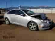 2015 Chevrolet Cruze LT with VIN 1G1PE5SB6F7201499, listed as a Copart auction lot 80032115 with 125,073 mi miles and Salvage title. Bid and sale history available at DreamBid. Image 4.