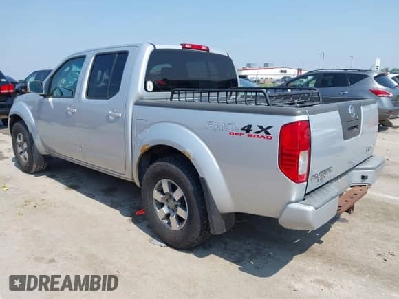 2011 Nissan Frontier Pro-4X with VIN 1N6AD0EV0BC415542, listed as a IAAI auction lot 42455036 with 153,099 mi miles and . Bid and sale history available at DreamBid. Image 3.