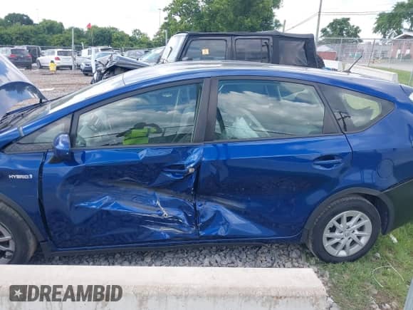 2016 Toyota Prius Two z VIN JTDZN3EU6GJ052551, wystawiony jako IAAI lot #42731714 z przebiegiem 104 450 mil mil oraz . Historia ofert i sprzedaży dostępna na DreamBid. Obrazek 14.